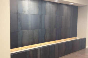 An image of a feature wall in a corporate office with a custom design