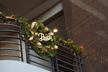 An image of a hanging Christmas wreath