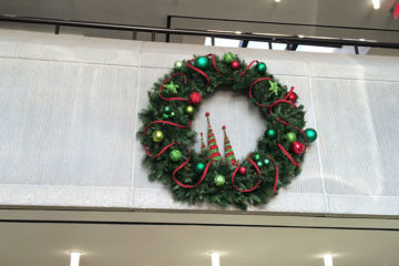An image of a hanging Christmas wreath